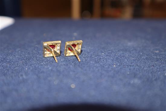 A pair of yellow metal, red stone and rose cut diamond set tablet ear studs.